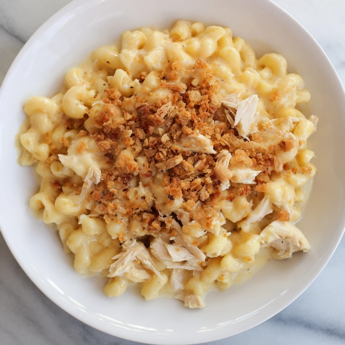 Golden-topped Struggle Meal Chicken Macaroni ready to serve, a hearty weeknight dinner option.