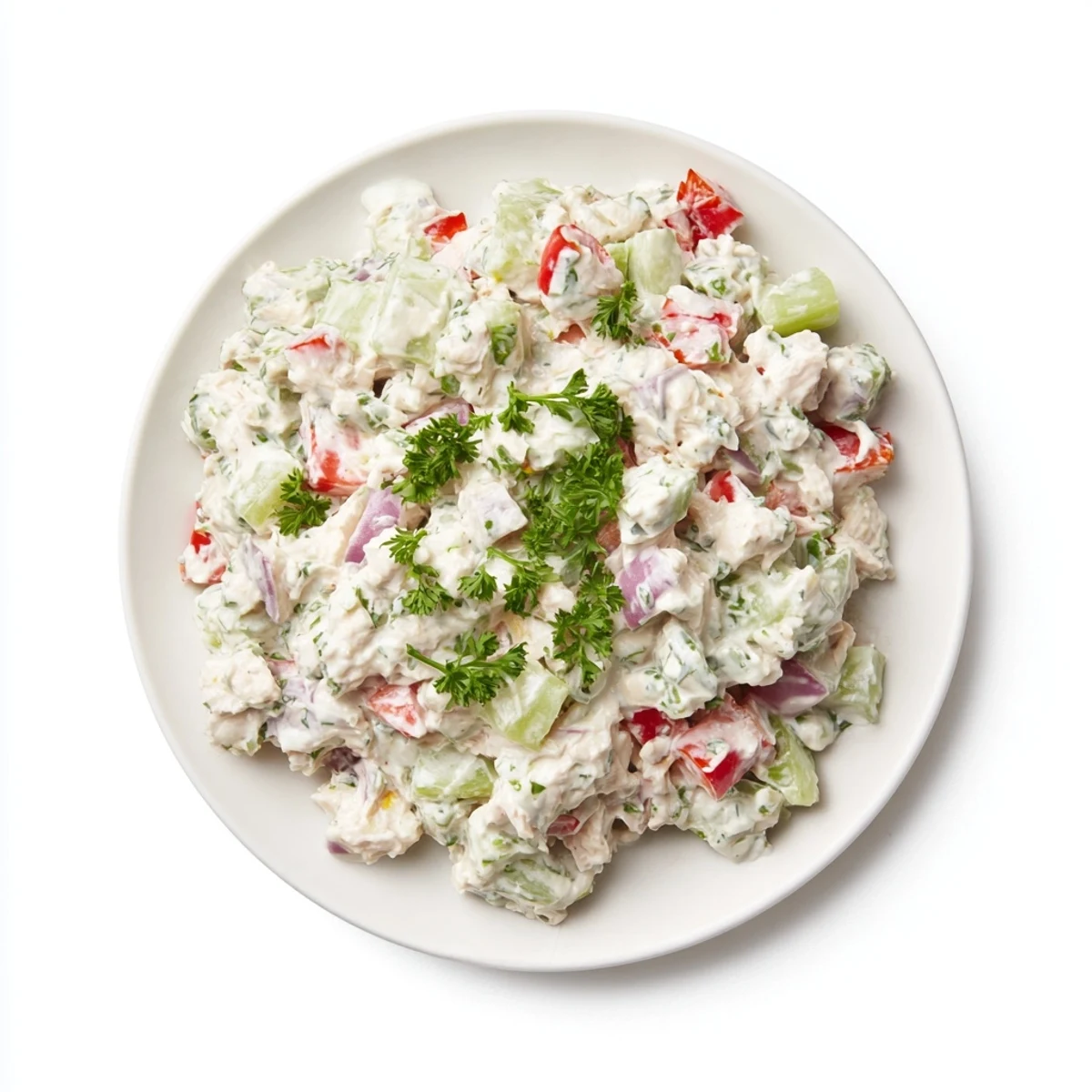 Creamy canned chicken salad with Mrs. Dash, celery, and red pepper, ready to eat and flavorful.