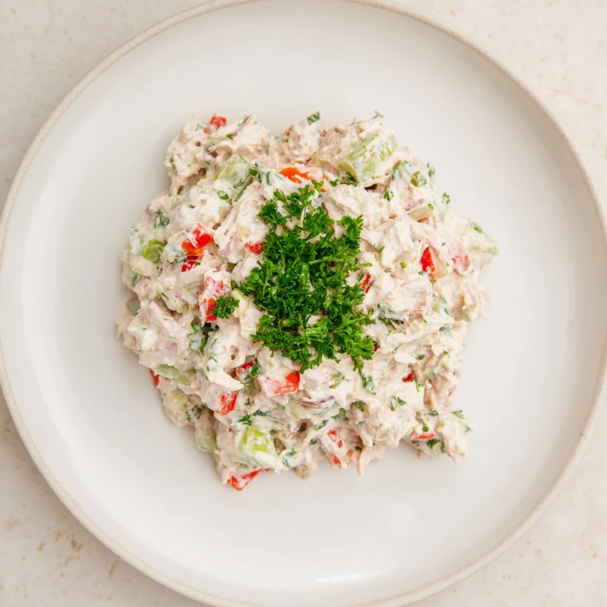 Freshly made canned chicken salad with Mrs. Dash, a refreshing, zesty, and easy lunch option.