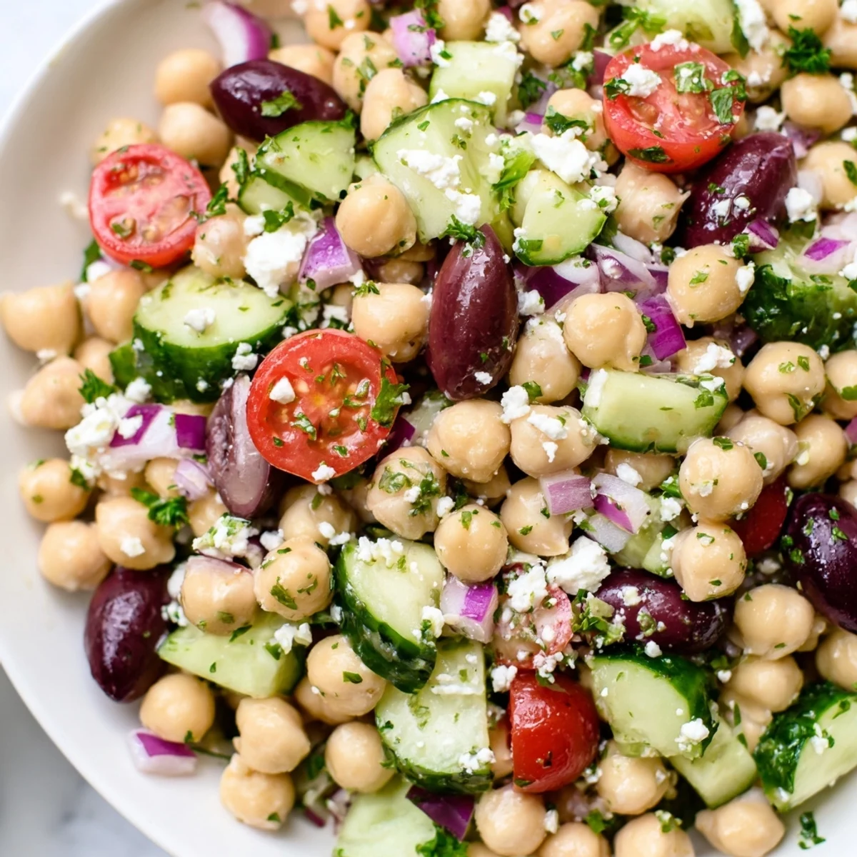 Fresh Mediterranean Chickpea Salad: Imagine the flavors – chickpeas, feta, and a bright, zesty bite.