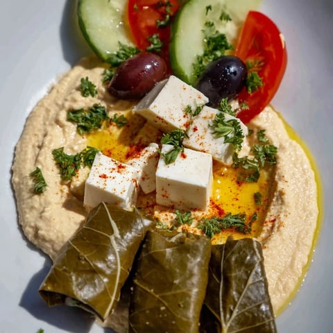 Turkish Meze Platter overflowing with colorful dips, cheeses, and olives, ready for sharing.