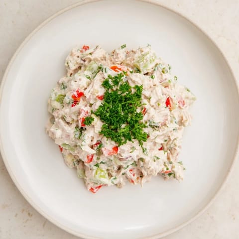 Freshly made canned chicken salad with Mrs. Dash, a refreshing, zesty, and easy lunch option.