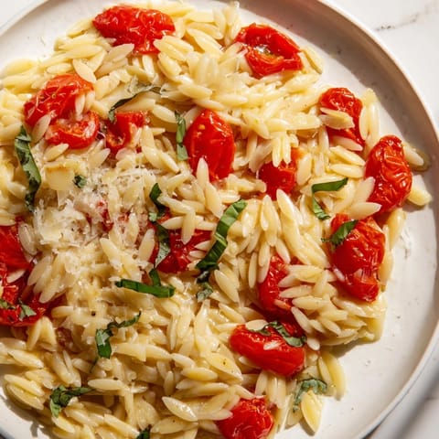 This creamy orzo tomato parmesan features juicy tomatoes and plenty of Parmesan cheese, delicious!