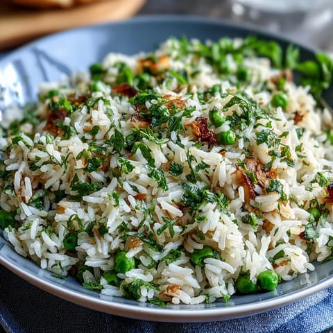 Spring Pea and Mint Rice Pilaf with vibrant green peas and fresh mint, served as a fragrant side dish perfect for spring meals.  
