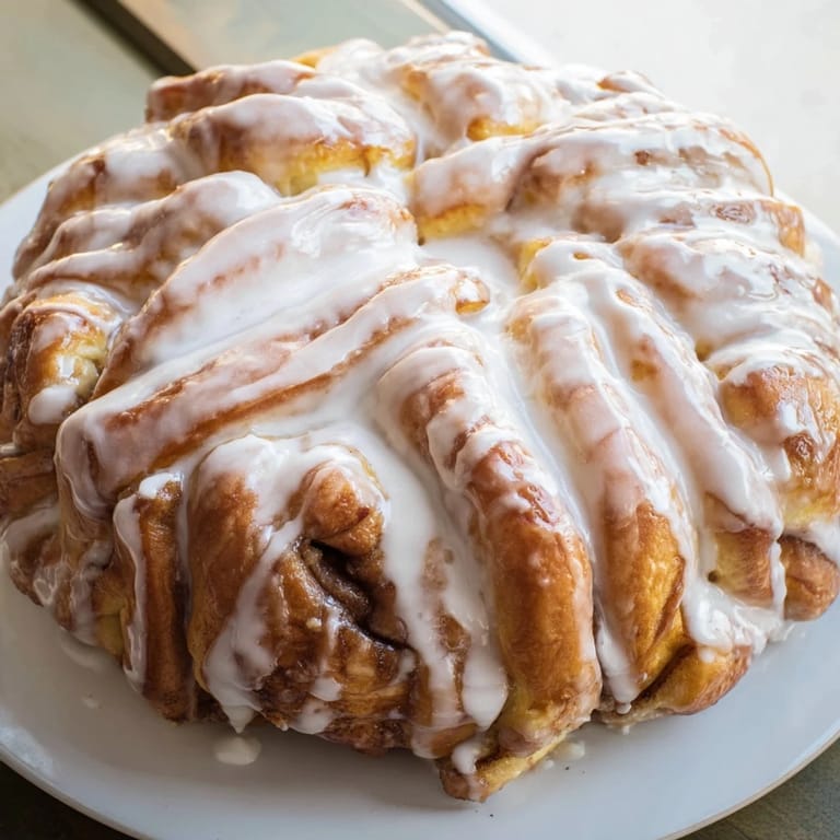 The beautiful snowflake shape of the Giant Sweet Roll, a delightful treat for holiday mornings.