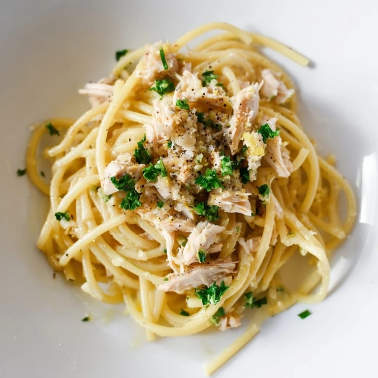 Savory Simple Garlic Butter Bucatini, ready in minutes, showcases perfectly cooked pasta and flavorful sauce.