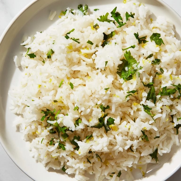 Steaming cilantro lime rice, a flavorful side dish perfect with tacos or your favorite recipes.