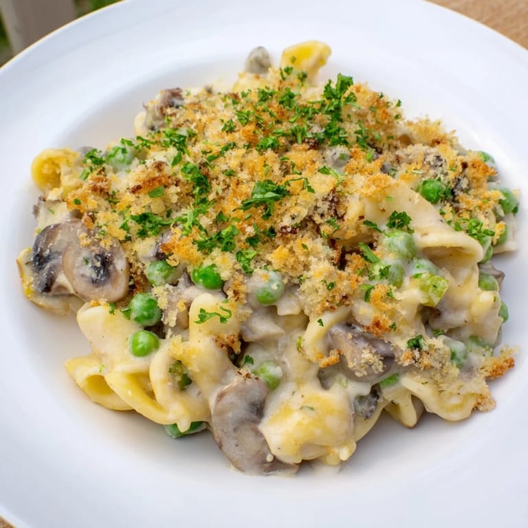 A creamy, cheesy Tuna Noodle Casserole 2.0 with a crispy topping—perfect for a comforting dinner.