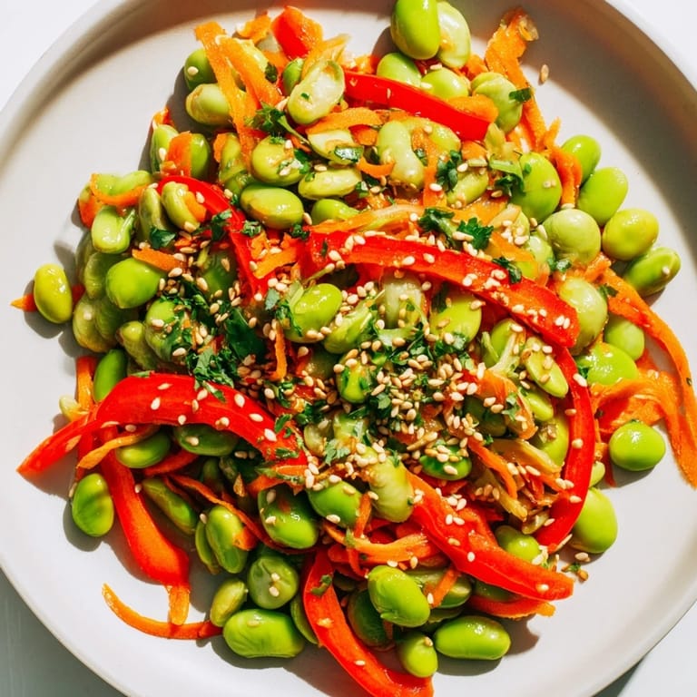 This beautiful Asian edamame salad showcases tender green edamame and colorful bell peppers, ready to enjoy.